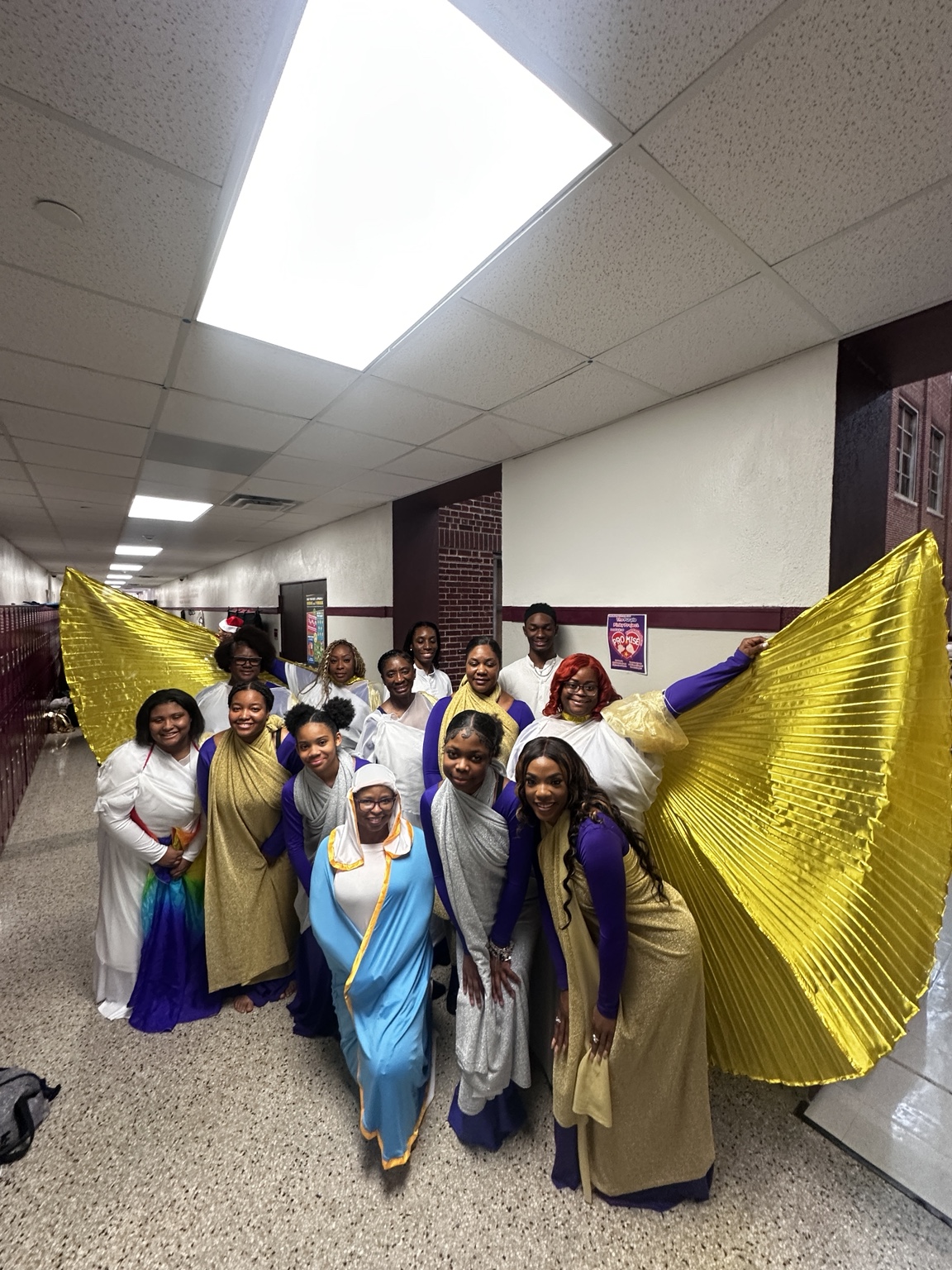 Prophecy in Motion group in gold and purple garments